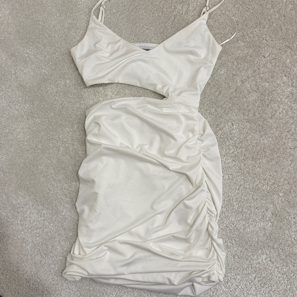 Elegant White Spaghetti strap Dress. Cut out on side. Size 4